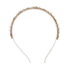 Pearl embellished hair band close shot